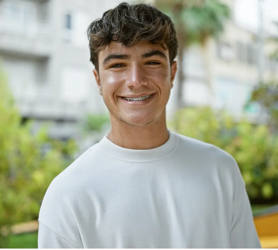 teenage boy smiling with braces